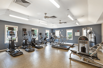 Updated fitness center with cardio and strength training equipment